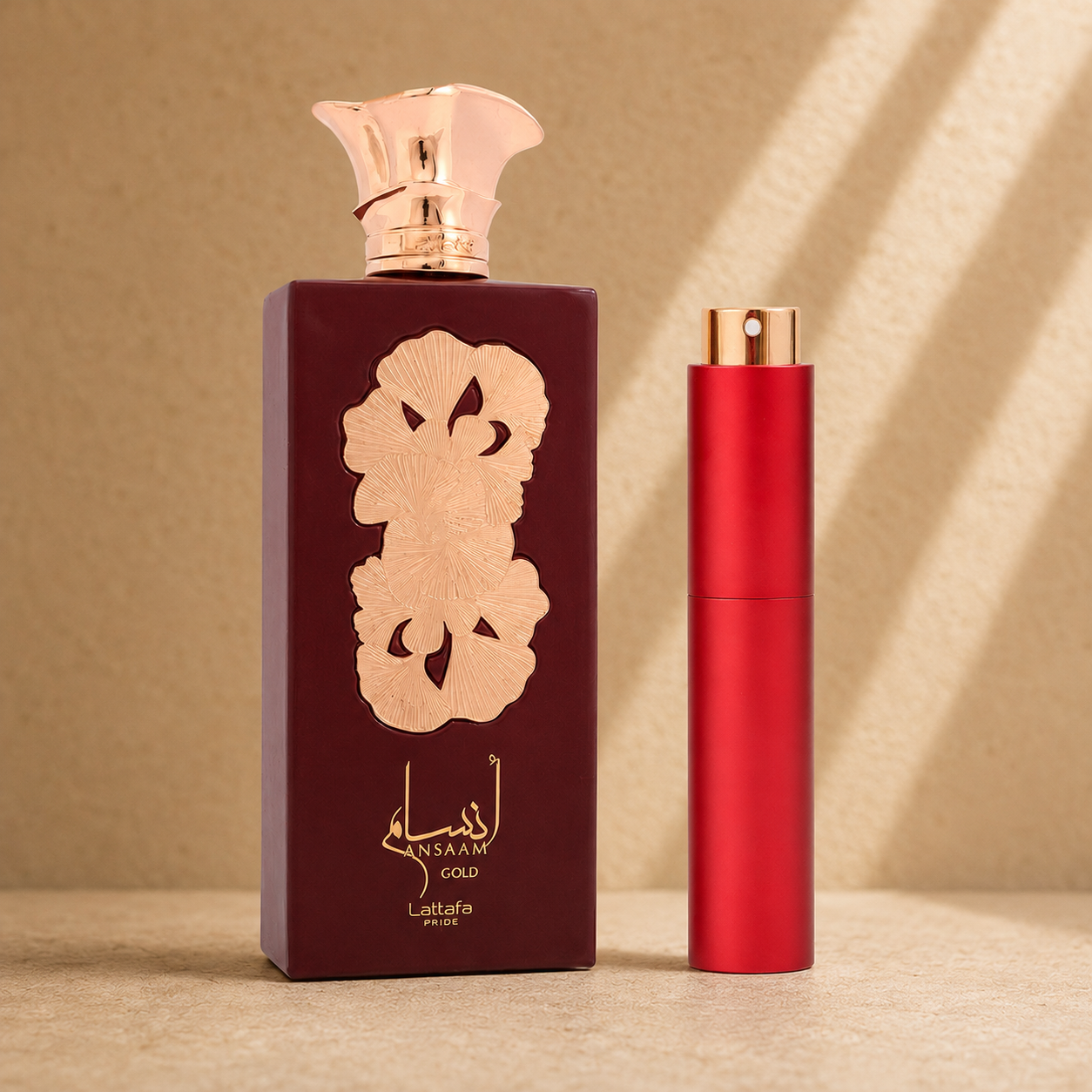 Lattafa Pride Ansaam Gold originalflaske med metallic roserød atomizer